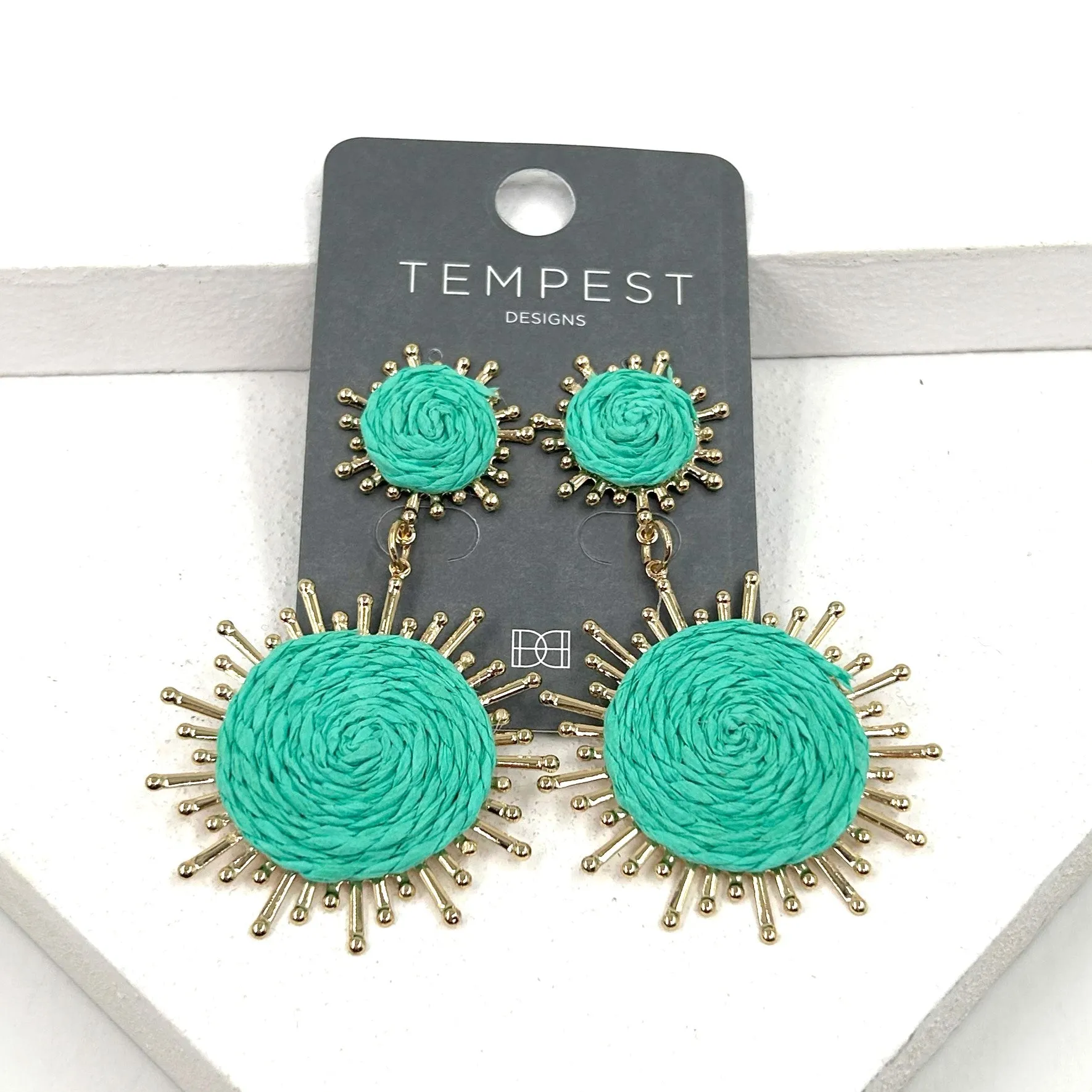 Circle burst dangle earrings with rattan inlay