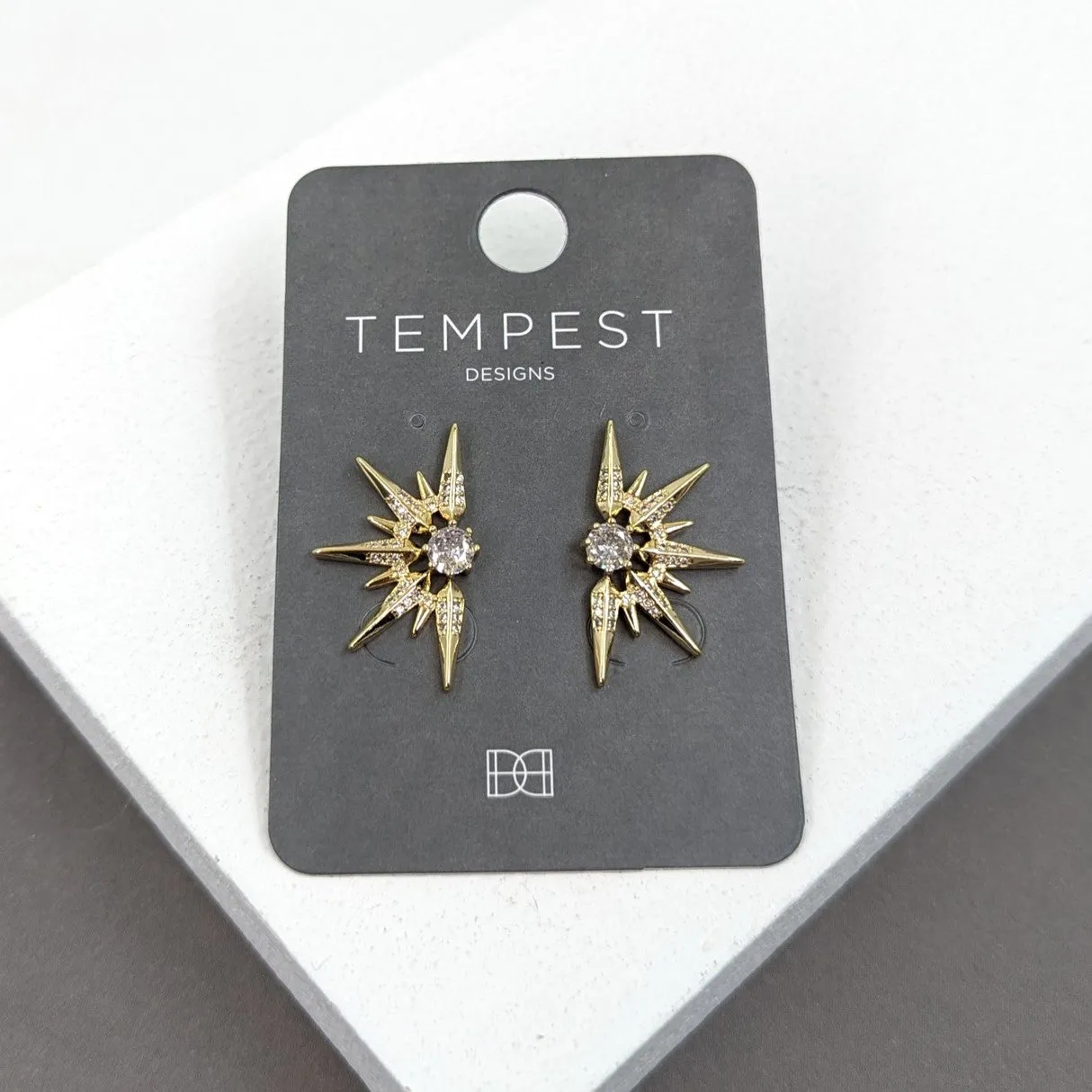 Half star burst earrings with central crystal