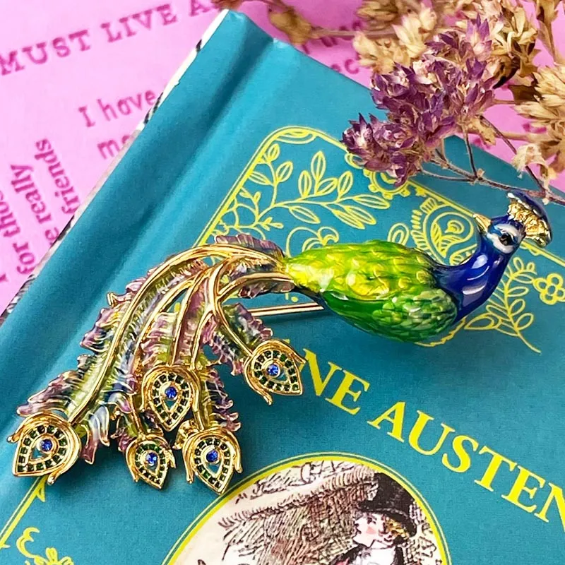 Pride and prejudice enamel peacock brooch