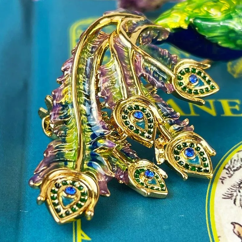 Pride and prejudice enamel peacock brooch