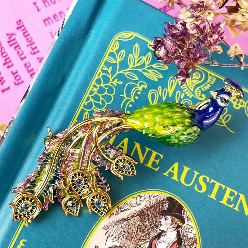 Pride and prejudice enamel peacock brooch