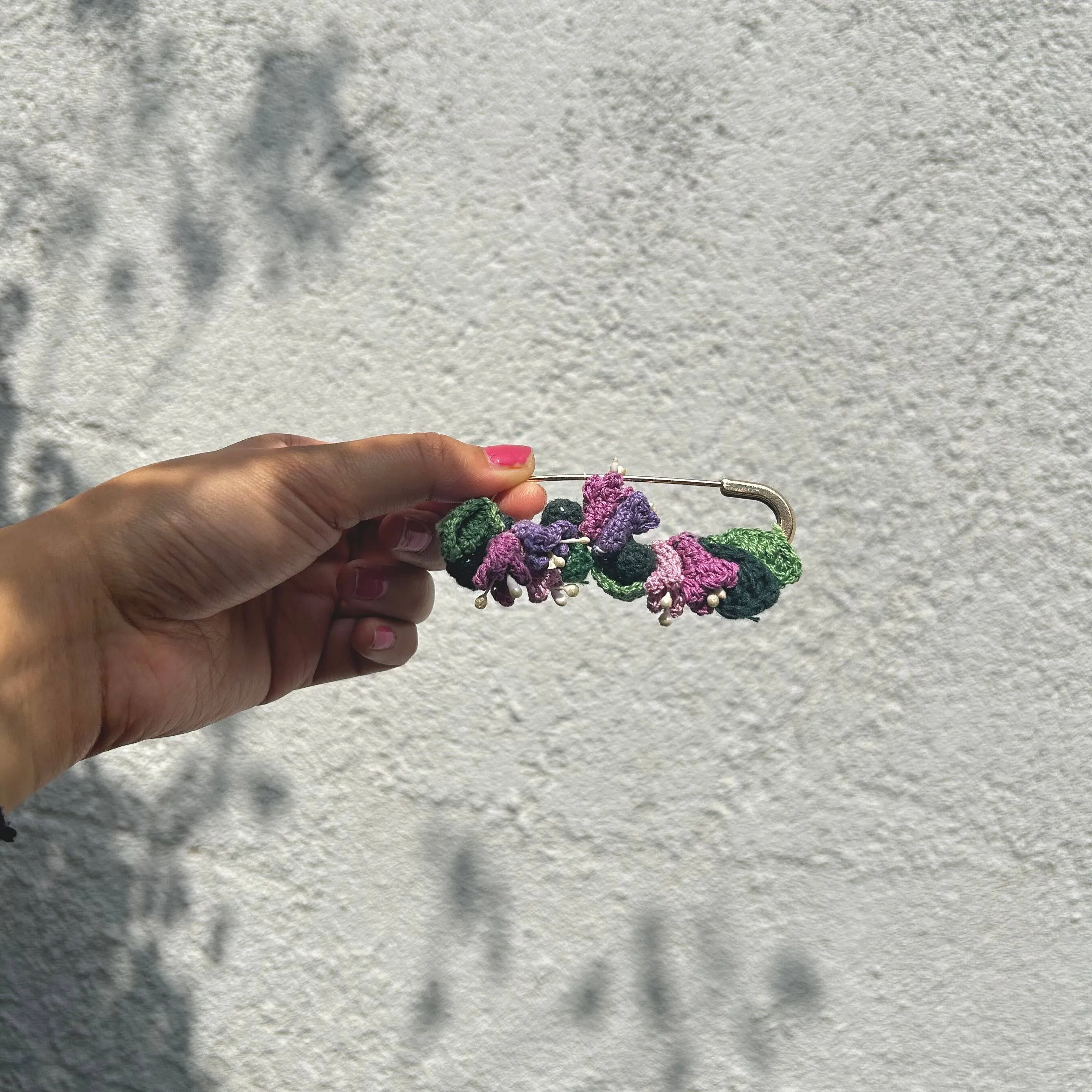 Tulip crochet brooch on a metal pin